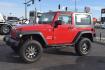 2010 RED /GRAY Jeep Wrangler Sport 4WD (1J4AA2D17AL) with an 3.8L V6 OHV 12V engine, 6-SPEED transmission, located at 607 W Columbia Drive, Kennewick, WA, 99336, (509) 582-8818, 46.216743, -119.126404 - Photo #0